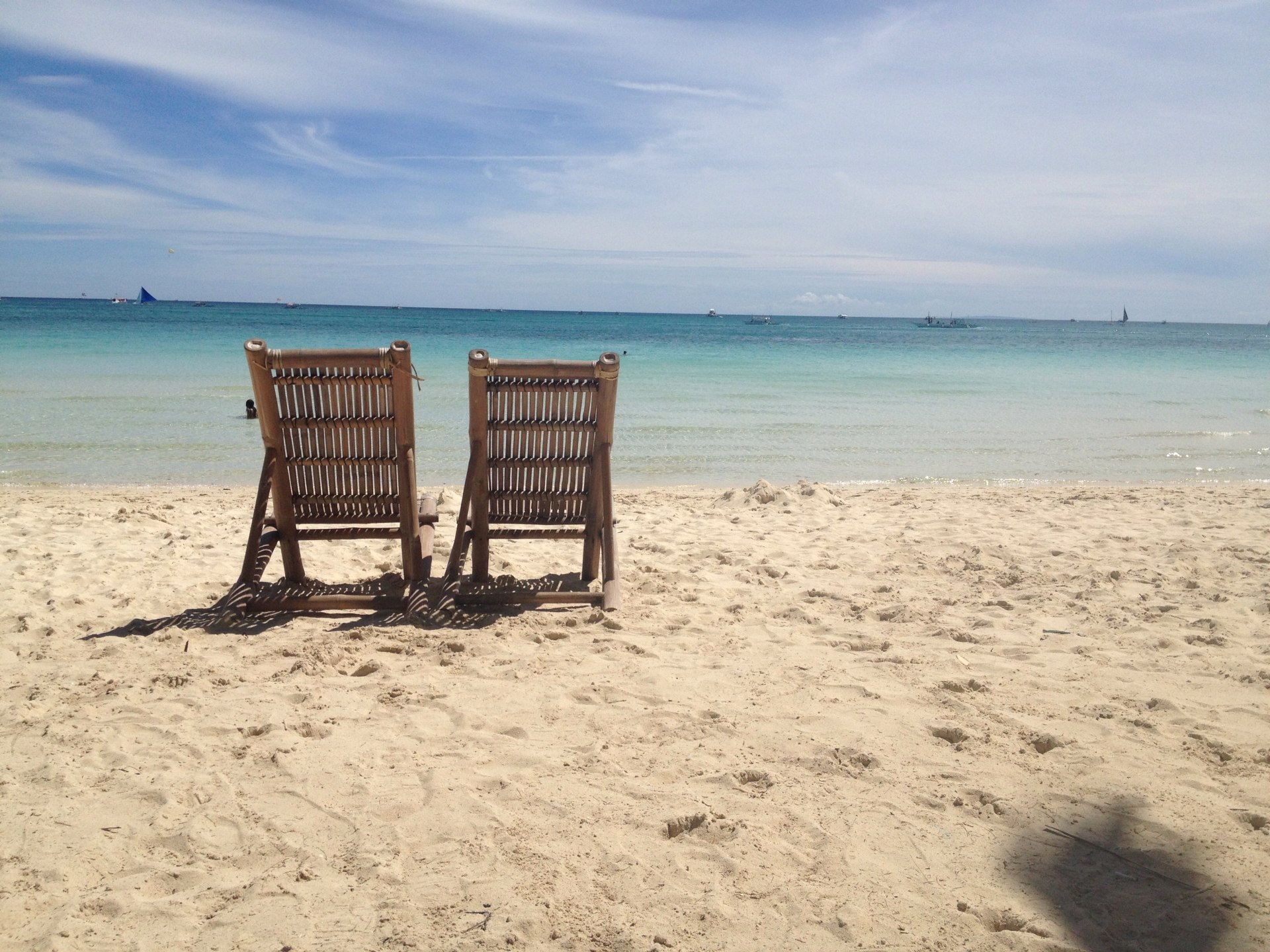 Chairs on White Beach Boracay by Thomas Galvez